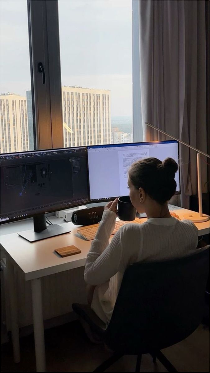 Woman surrounded by Apple devices researching social narratives and cultural trends
